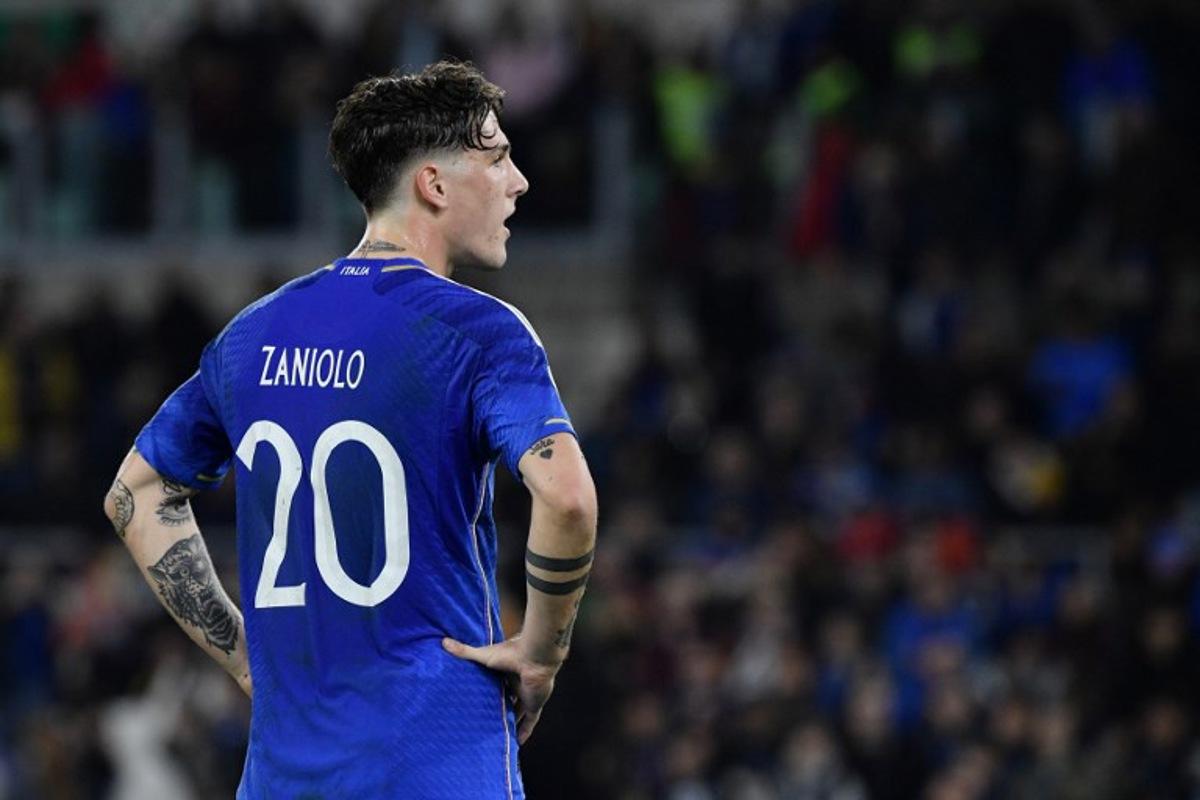 Italy's forward Nicolo Zaniolo reacts during the UEFA Euro 2024 qualifying Group C football match between Italy and North Macedonia at the Olympic Stadium in Rome on November 17, 2023.  Filippo MONTEFORTE / AFP