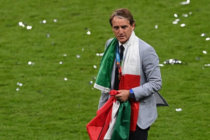 Italy's coach Roberto Mancini walks off the pitch after Italy won the UEFA EURO 2020 final football match between Italy and England at the Wembley Stadium in London on July 11, 2021.  FACUNDO ARRIZABALAGA / POOL / AFP