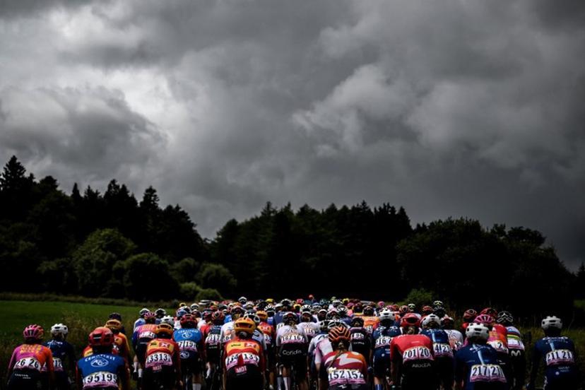 The pack rides during the second stage (out of 8) of the second edition of the Women's Tour de France cycling race 151 km between Clermont-Ferrand and Mauriac, in the Auvergne-Rhone-Alpes region, south-eastern France, on July 24, 2023.  JEFF PACHOUD / AFP