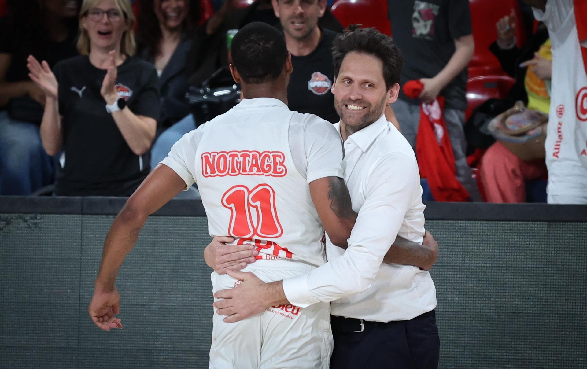 Spirou's head coach Sam Rotsaert and Spirou's Eric Nottage celebrate during a basketball match between Spirou Charleroi and House of Talents Spurs Kortrijk, Sunday 19 April 2026 in Charleroi, on day 30 of the 'BNXT League' Belgian and Dutch first division basket championships. BELGA PHOTO VIRGINIE LEFOUR