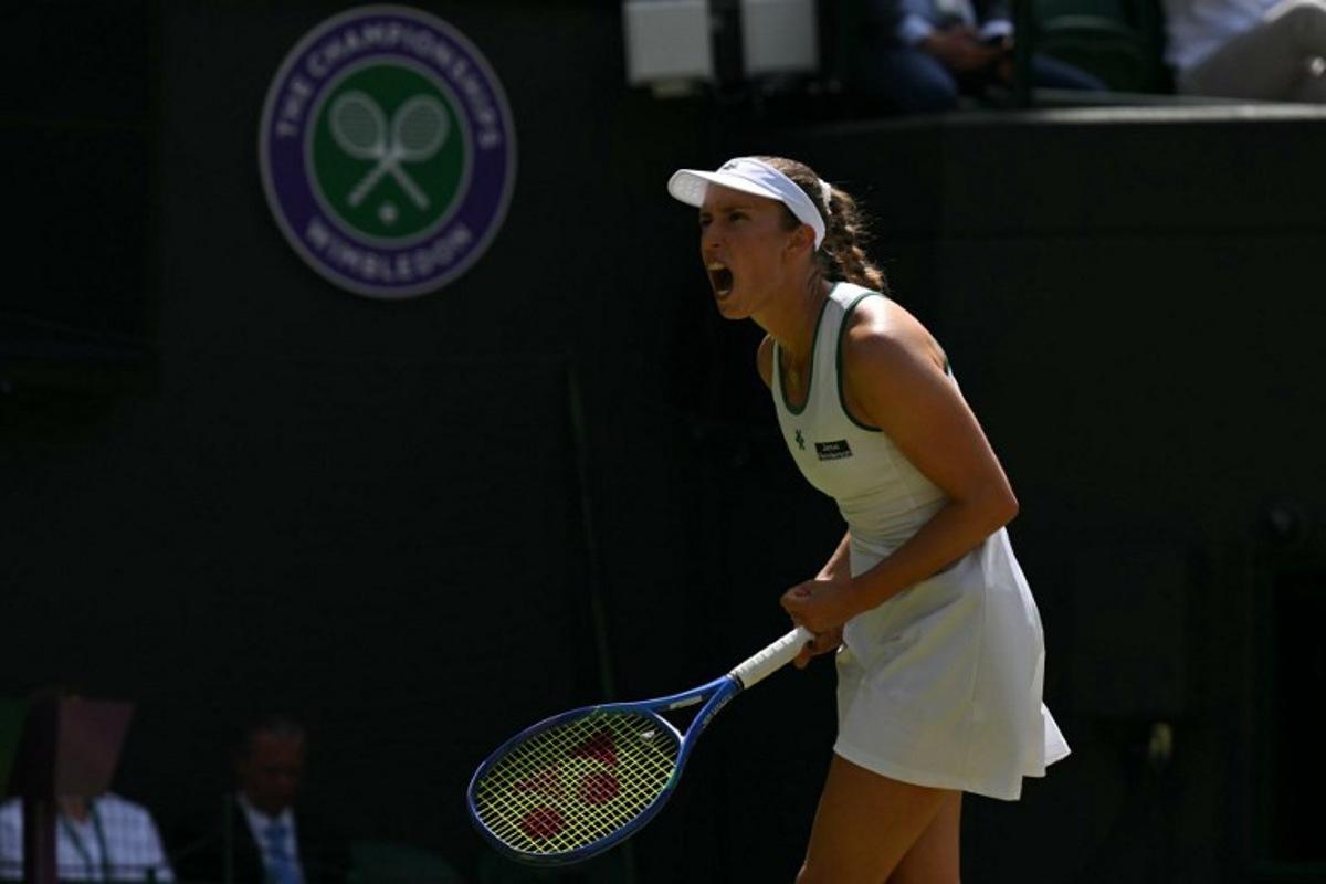 Belgium's Elise Mertens celebrates against Kazakhstan's Elena Rybakina during their women's singles third round tennis match on the sixth day of the 2026 Wimbledon Championships at The All England Lawn Tennis and Croquet Club in Wimbledon, southwest London, on July 4, 2026.  Glyn KIRK / AFP