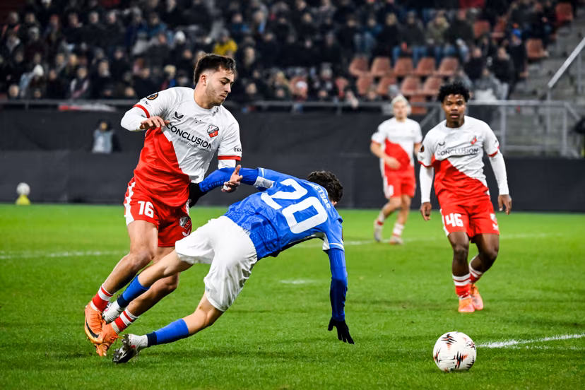 Genk's Konstantinos Kos Karetsas is taken down in the penalty box by and Utrecht's Souffian El Karouani during a soccer game between Dutch soccer club FC Utrecht and Belgian KRC Genk, on Thursday 22 January 2026 in Utrecht, Netherlands, the seventh game (out of 8) in the league phase of the UEFA Europa League competition. BELGA PHOTO TOM GOYVAERTS