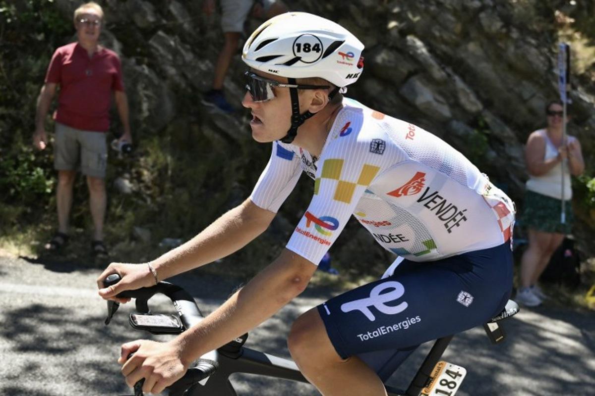 Team TotalEnergies' French rider Thomas Gachignard is distanced at the back of the pack of riders (peloton) during the 16th stage of the 112th edition of the Tour de France cycling race, 171.5 km between Montpellier and Mont Ventoux, southern France, on July 22, 2025. Marco BERTORELLO / AFP