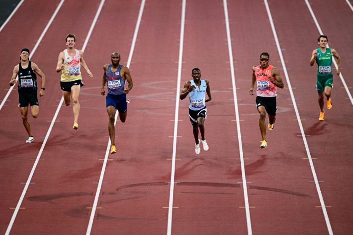 (From L) Argentina's Elian Larregina, Belgium's Alexander Doom, Great Britain's Matthew Hudson-Smith, Botswana's Bayapo Ndori, Japan's athlete Yuki Joseph Nakajima and Australia's athlete Cooper Sherman compete in the men's 400m heats during the World Athletics Championships in Tokyo on September 14, 2025. Yuichi YAMAZAKI / AFP