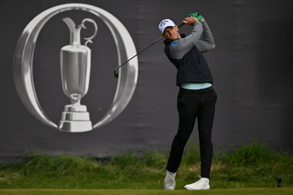Belgium's Thomas Detry watches his shot from the 1st tee on the opening day of the 153rd Open Championship at Royal Portrush golf club in Northern Ireland on July 17, 2025. Glyn KIRK / AFP