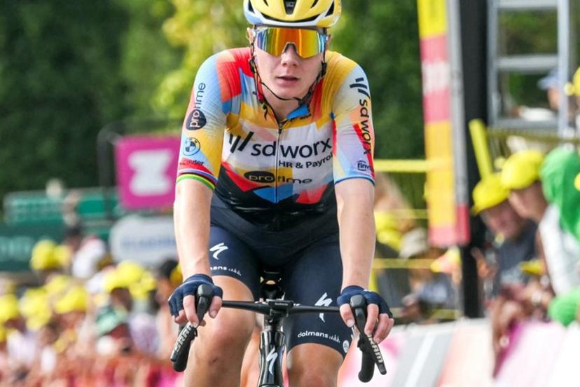 Team SD Worx-Protime's Belgian rider Lotte Kopecky crosses the finish line to finish in second-placed in the 3rd (out of 9) stage of the fifth edition of the Women's Tour de France cycling race, 156.5 km from Geneva to Poligny, in Poligny, central-eastern France on August 3, 2026. NICOLAS TUCAT / AFP