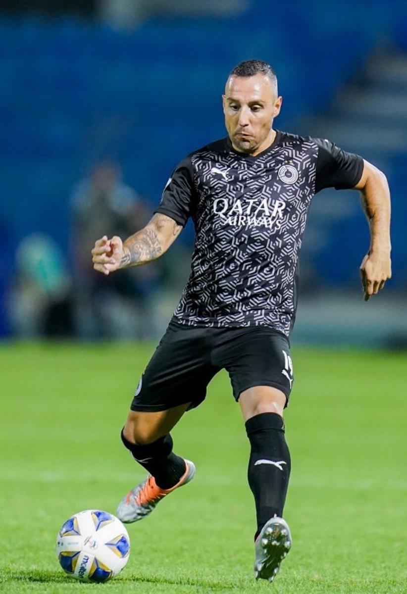 Sadd's midfielder Santi Cazorla runs with the ball during the AFC Champions League group E match between Qatar's al-Sadd and Jordan's al-Wehdat at Prince Mohamed bin Fahd Stadium in Saudi Arabia's Dammam on April 15, 2022. Yousef DOUBISI / AFP