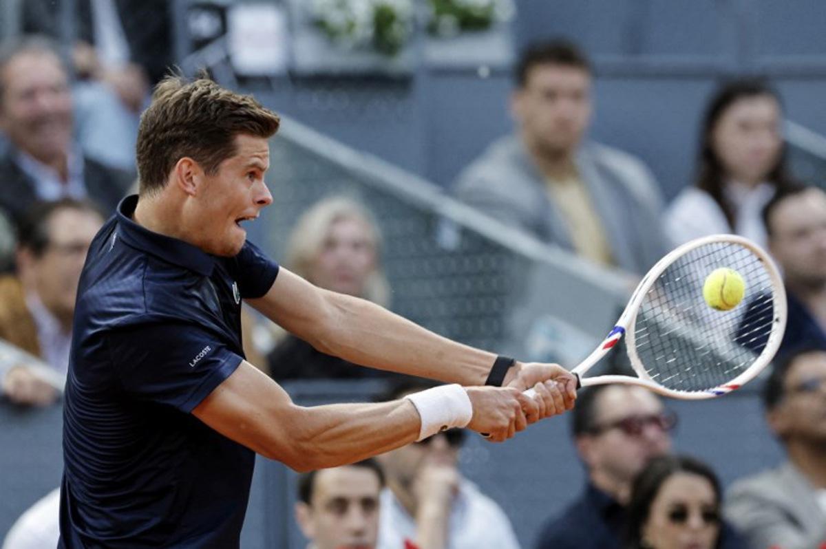 Belgium's Alexander Blockx returns the ball to Germany's Alexander Zverev during their 2026 ATP Tour Madrid Open tennis tournament semi-final singles match at the Caja Magica in Madrid, on May 1, 2026. OSCAR DEL POZO / AFP