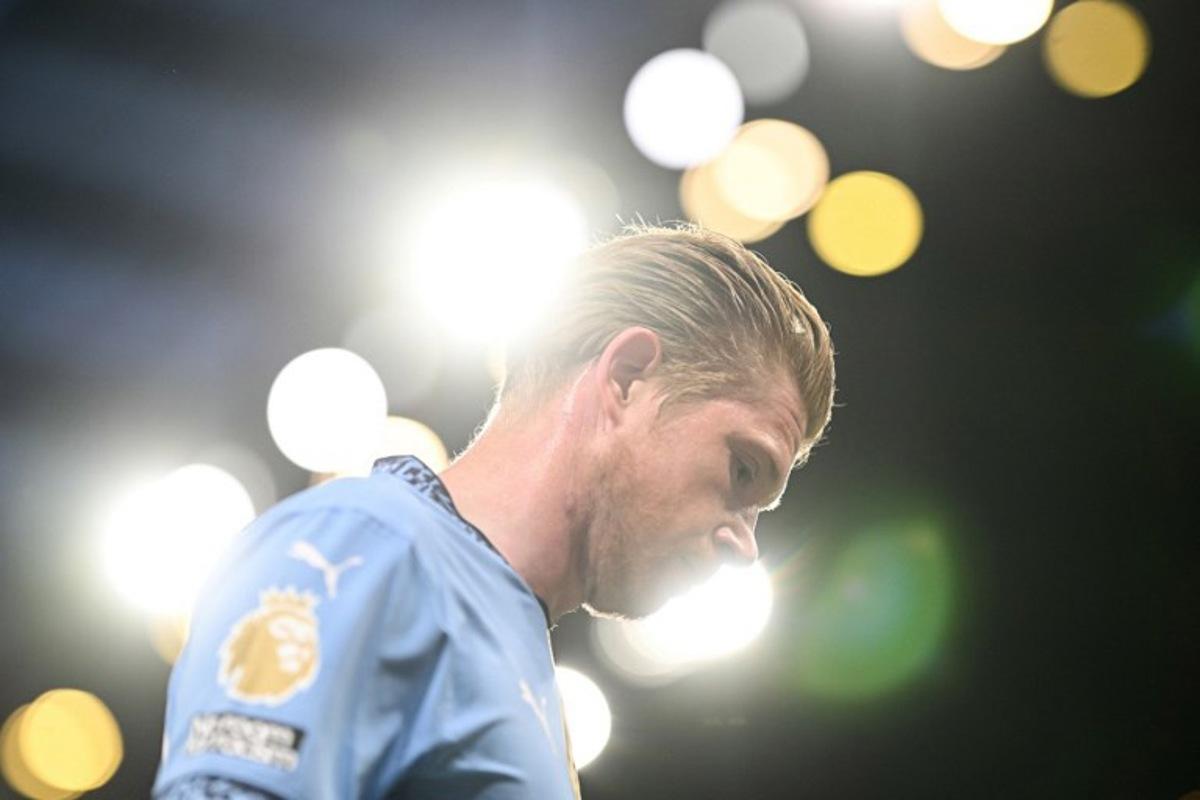 Manchester City's Belgian midfielder #17 Kevin De Bruyne reacts during the English Premier League football match between Manchester City and Aston Villa at the Etihad Stadium in Manchester, north west England, on April 22, 2025. Oli SCARFF / AFP