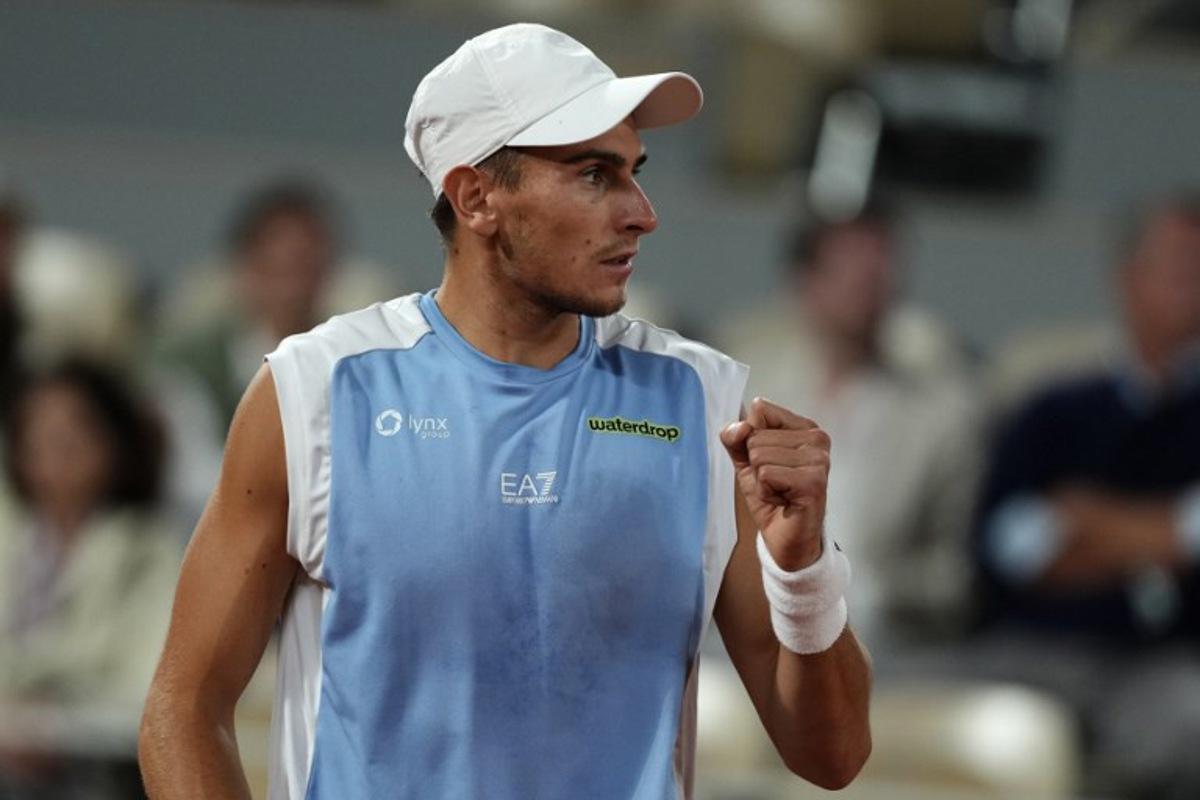 Italy's Matteo Arnaldi reacts to a point against Italy's Matteo Berrettini during their men's quarter final singles match on day 11 of the French Open tennis tournament on Court Philippe-Chatrier at the Roland-Garros Complex in Paris on June 3, 2026. Dimitar DILKOFF / AFP