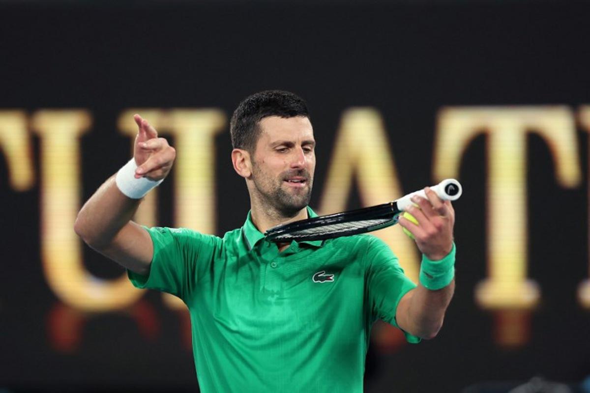 Serbia's Novak Djokovic celebrates victory over Netherlands' Botic van de Zandschulp after their men's singles match on day seven of the Australian Open tennis tournament in Melbourne on January 24, 2026. Martin KEEP / AFP