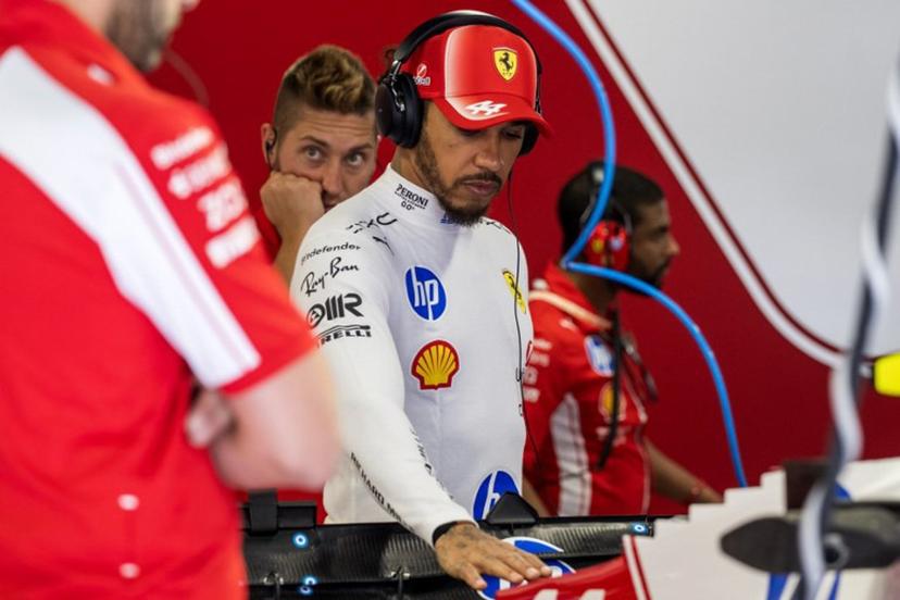 Ferrari's British driver Lewis Hamilton inspects his car during the first practice session at the Hungaroring racetrack in Mogyorod near Budapest, Hungary, on July 24, 2026 ahead of the Formula One Hungarian Grand Prix. Andrej ISAKOVIC / AFP