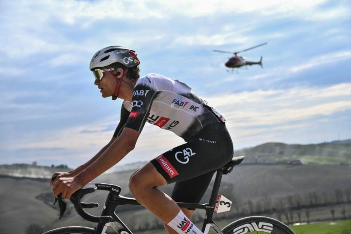 Team UAE's Mexican rider Isaac Del Toro rides during the 19th one-day classic Strade Bianche (White Roads) men's cycling race between Siena and Siena in Tuscany on March 8, 2025. Marco BERTORELLO / AFP