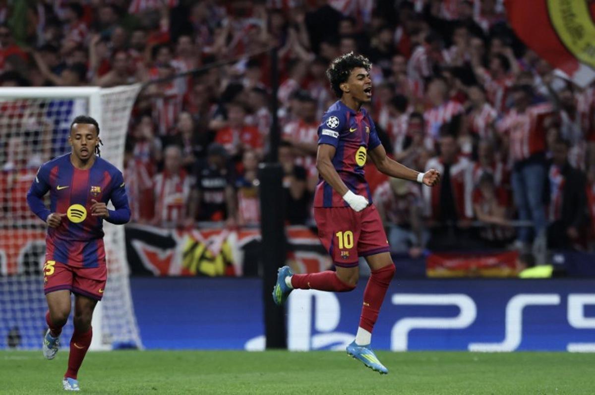 Barcelona's Spanish forward #10 Lamine Yamal celebrates scoring his team's first goal during the UEFA Champions League quarter final second leg football match between Club Atletico de Madrid and FC Barcelona at Metropolitano Stadium in Madrid on April 14, 2026. Thomas COEX / AFP