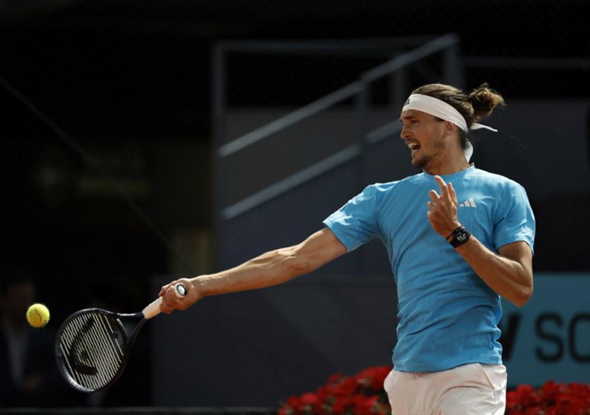 Germany's Alexander Zverev returns the ball to Czech Republic's Jakub Mensik during their 2026 ATP Tour Madrid Open tennis tournament singles match at the Caja Magica in Madrid, on April 28, 2026. OSCAR DEL POZO / AFP