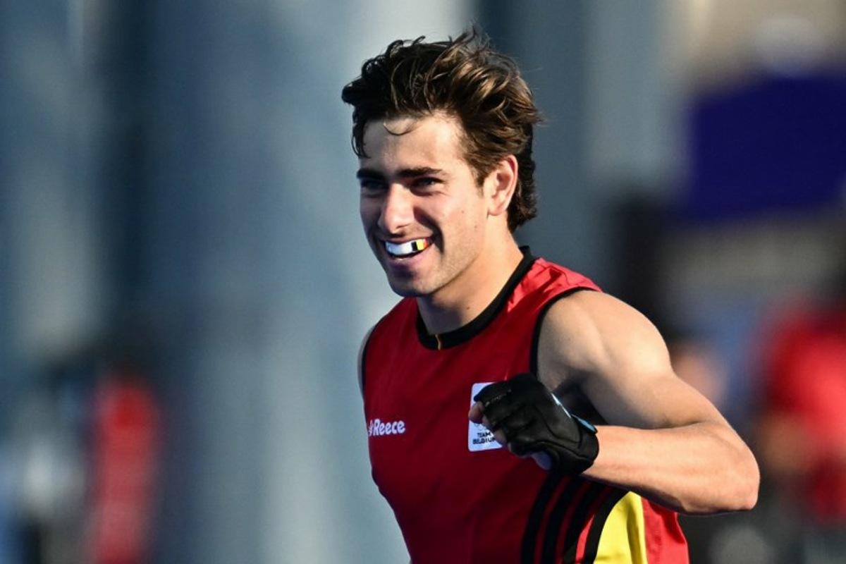 Belgium's forward #03 Thibeau Stockbroekx celebrates scoring his team's third goal in the men's pool B field hockey match between Belgium and Argentina during the Paris 2024 Olympic Games at the Yves-du-Manoir Stadium in Colombes on August 2, 2024. Loic VENANCE / AFP