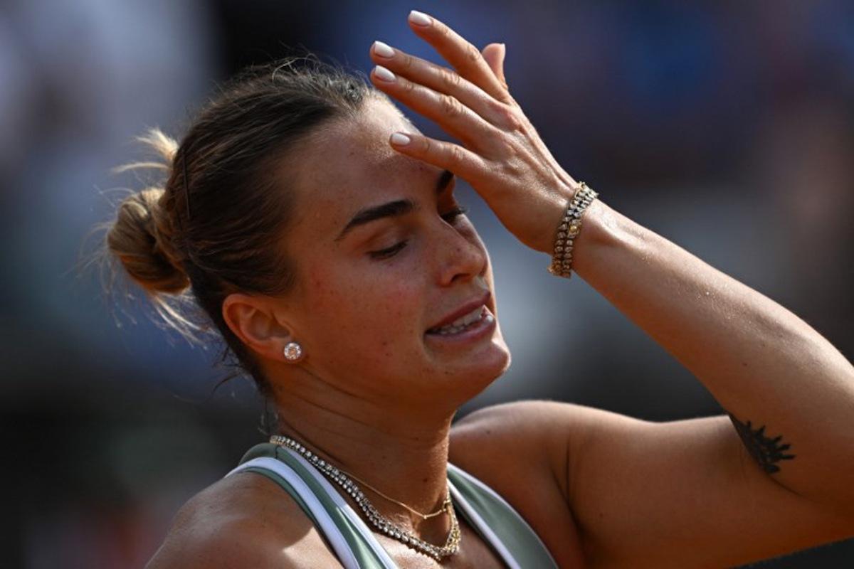 Belarus' Aryna Sabalenka reacts during her match against Romania's Sorana Cirstea during the WTA Rome Open tennis tournament at Foro Italico in Rome on May 9, 2026. Tiziana FABI / AFP