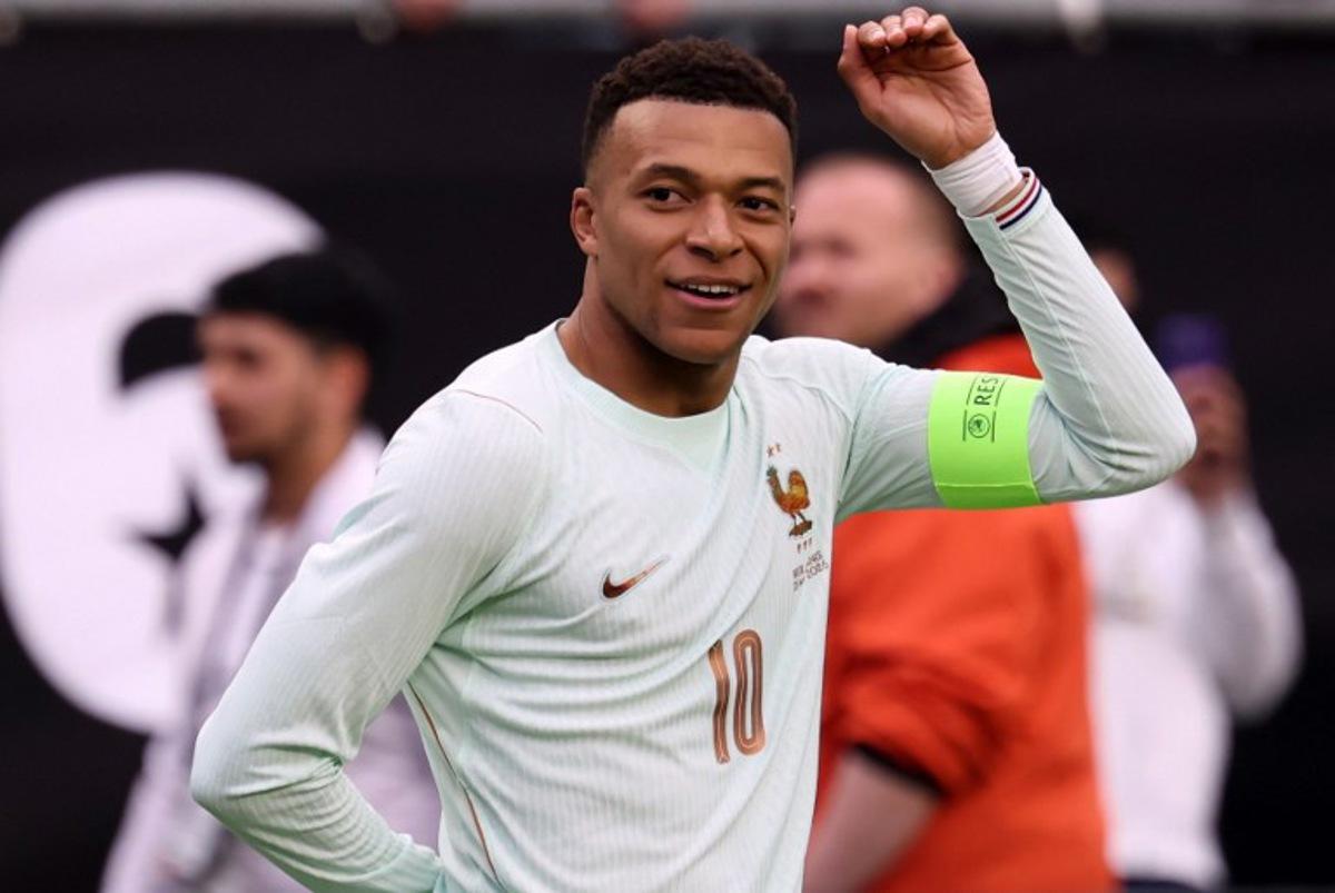 France's forward #10 Kylian Mbappe celebrates after scoring during a friendly football match between Brazil and France at Gillette Stadium in Foxborough, Massachusetts, on March 26, 2026. FRANCK FIFE / AFP