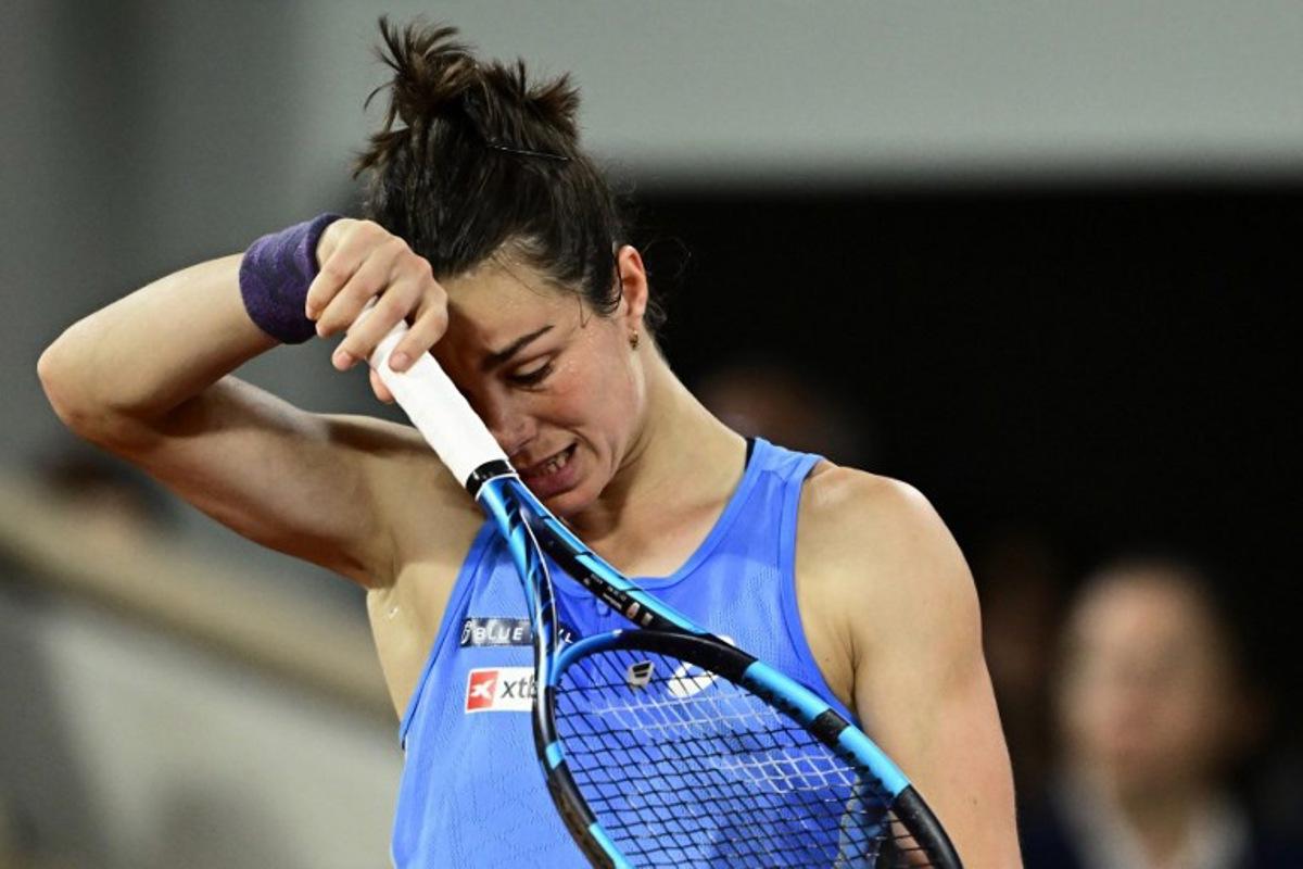 France's Lois Boisson reacts during her women's singles semi-final match against US Coco Gauff on day 12 of the French Open tennis tournament on Court Philippe-Chatrier at the Roland-Garros Complex in Paris on June 5, 2025. JULIEN DE ROSA / AFP