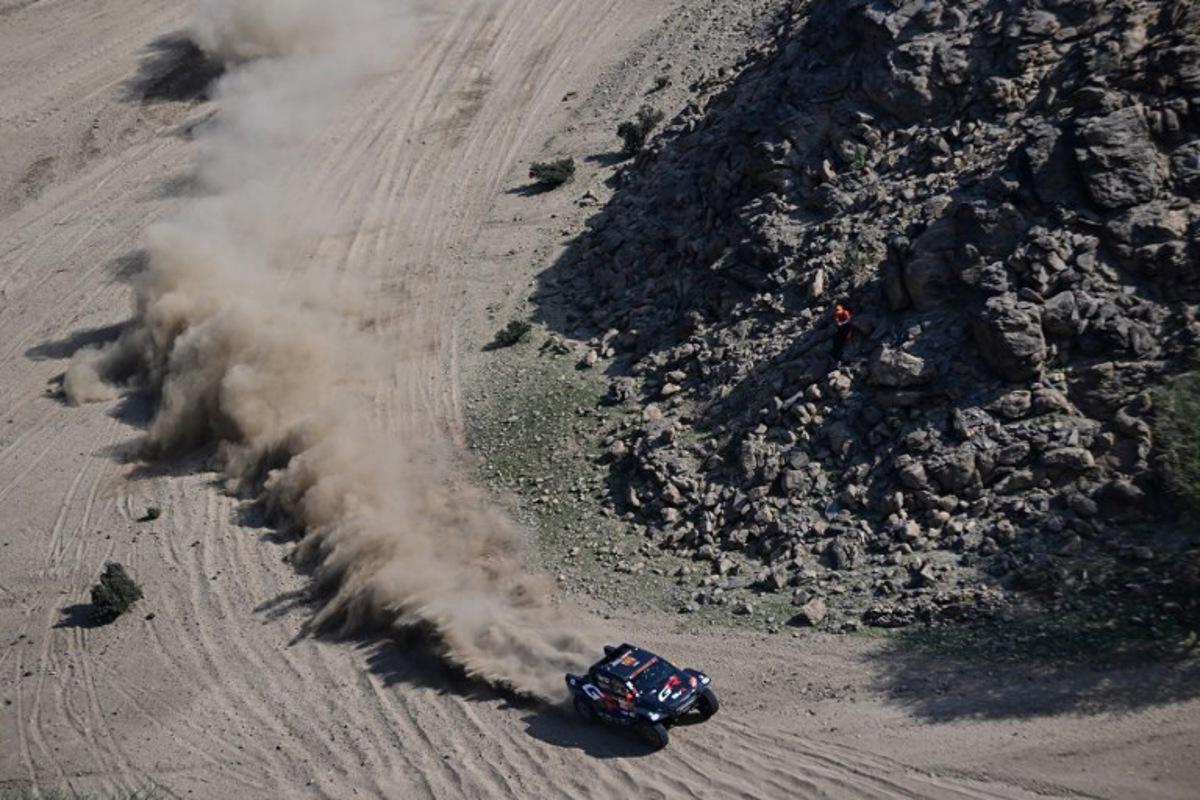 Toyota Gazoo Racing SA's South African driver Saood Variawa and French co-driver Francois Cazalet compete in the Stage 1 of the 48th edition of the Dakar Rally 2026, between Yanbu and Yanbu, Saudi Arabia, on January 4, 2026. Giuseppe CACACE / AFP