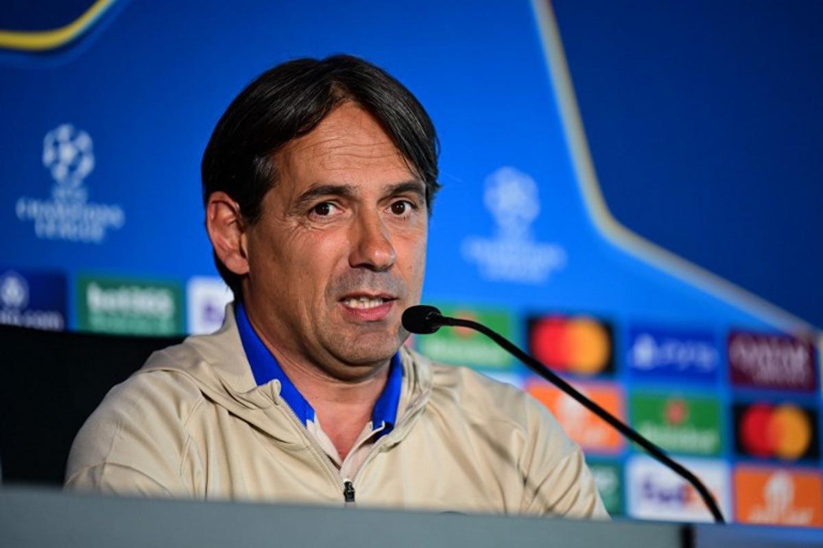 Inter Milan's Italian coach Simone Inzaghi gives a press conference ahead of the UEFA Champions League final football match against Paris Saint-Germain (PSG) as part of the club's media day in Appiano Gentile, Italy, on May 26, 2025. Piero CRUCIATTI / AFP
