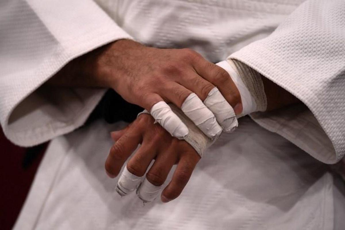 A judoka gets ready for a bout during the Tokyo 2020 Olympic Games at the Nippon Budokan in Tokyo on July 25, 2021. Franck FIFE / AFP