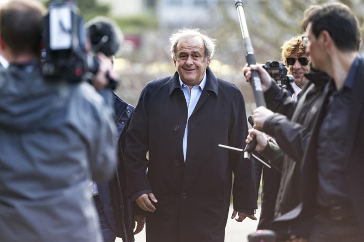 Former UEFA president Michel Platini arrives at the courthouse for the verdict of an appeal by Swiss Attorney General's office against former UEFA and FIFA presidents over a suspected fraudulent payment, in Muttenz near Basel, on March 25, 2025. Fabrice COFFRINI / AFP