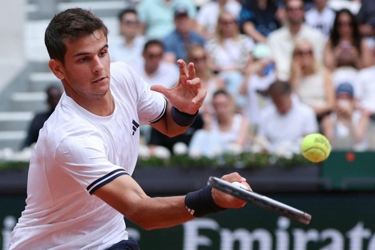 Spain's Rafael Jodar plays a forehand return to Spain's Pablo Carreno Busta during their men's singles match on day 8 of the French Open tennis tournament on Court Suzanne-Lenglen at the Roland-Garros Complex in Paris on May 31, 2026. ALAIN JOCARD / AFP