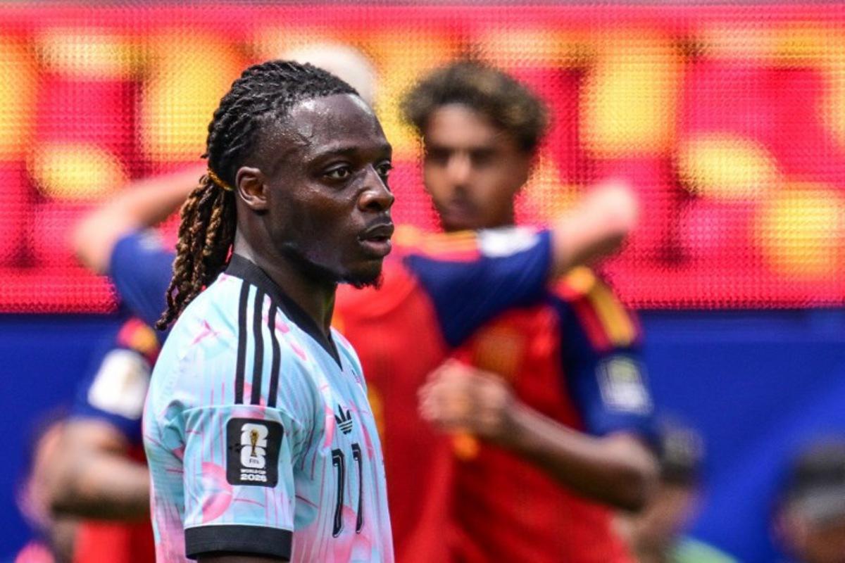 Belgium's forward #11 Jeremy Doku reacts after Spain's midfielder #08 Fabian Ruiz scores his team's first goal during the 2026 World Cup football tournament quarter-final match between Spain and Belgium at the Los Angeles Stadium in Inglewood on July 10, 2026. Frederic J. Brown / AFP