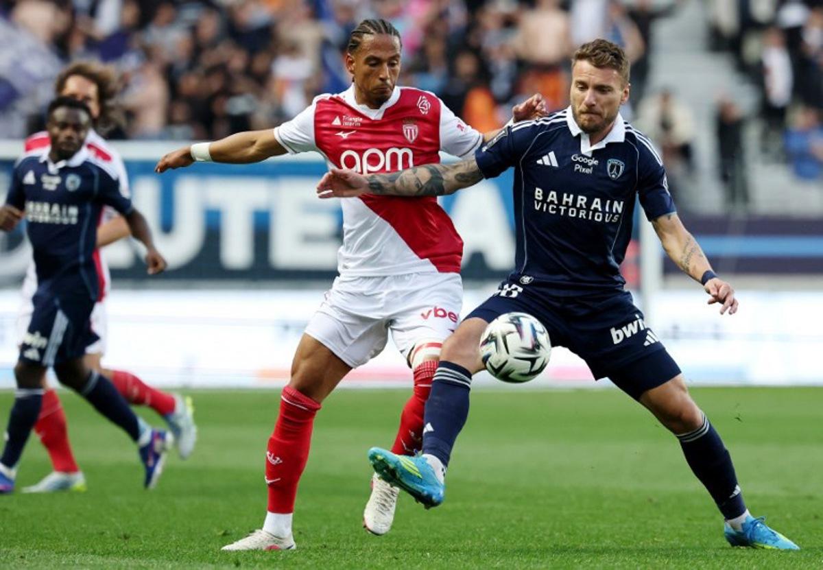 Monaco's German defender #05 Thilo Kehrer (L) fights for the ball with Paris FC's Italian forward #36 Ciro Immobile during the French L1 football match between Paris FC and AS Monaco (ASM) at Stade Jean Bouin in Paris on April 10, 2026. FRANCK FIFE / AFP