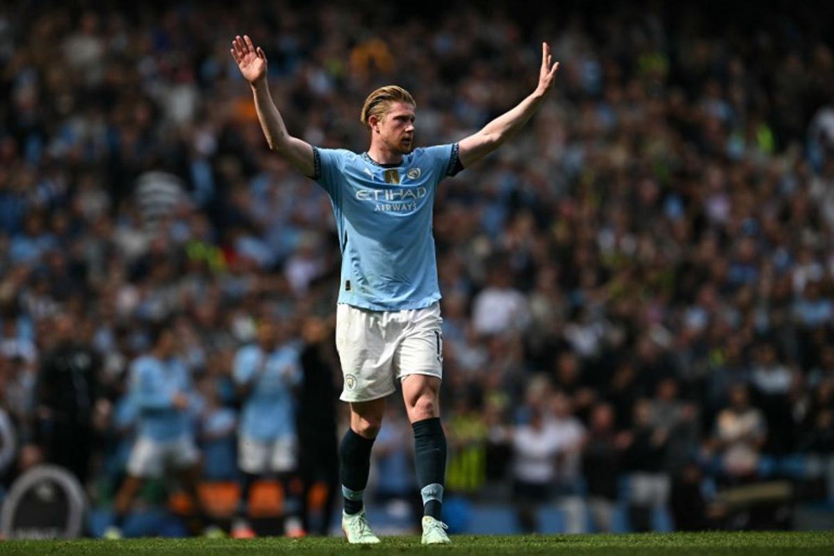 Manchester City's Belgian midfielder #17 Kevin De Bruyne reacts as he is substituted during the English Premier League football match between Manchester City and Crystal Palace at the Etihad Stadium in Manchester, north west England, on April 12, 2025. Paul ELLIS / AFP