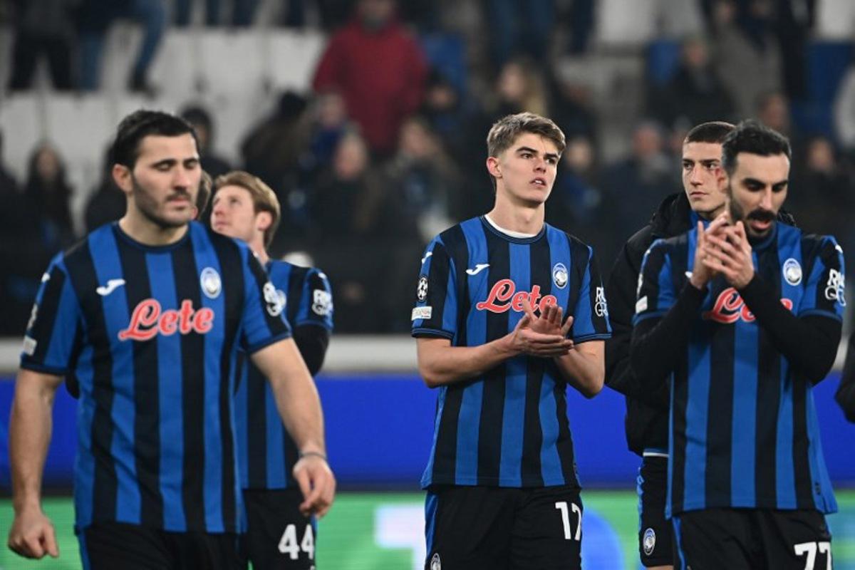 Atalanta's Belgian midfielder #17 Charles De Ketelaere (C) reacts at the end of the UEFA Champions League knockout phase play-off 2nd leg football match between Club Brugge KV and Atalanta at the Stadio di Bergamo in Bergamo on February 18, 2025. Isabella BONOTTO / AFP