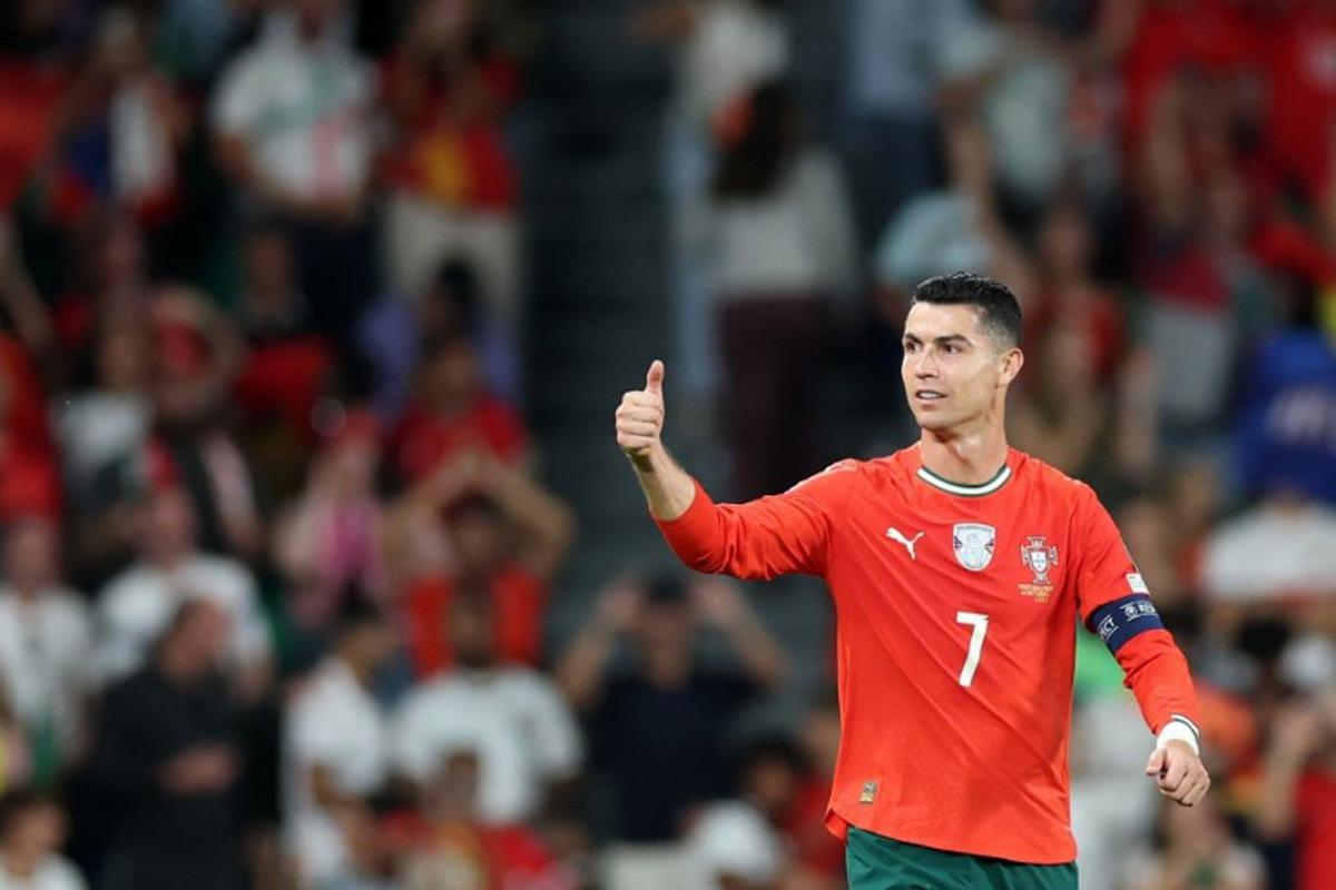 Portugal's forward #07 Cristiano Ronaldo celebrates scoring his team's second goal during the 2026 World Cup qualifiers Europe zone group F football match between Portugal and Hungary at Jose Alvalade stadium in Lisbon on October 14, 2025. PATRICIA DE MELO MOREIRA / AFP