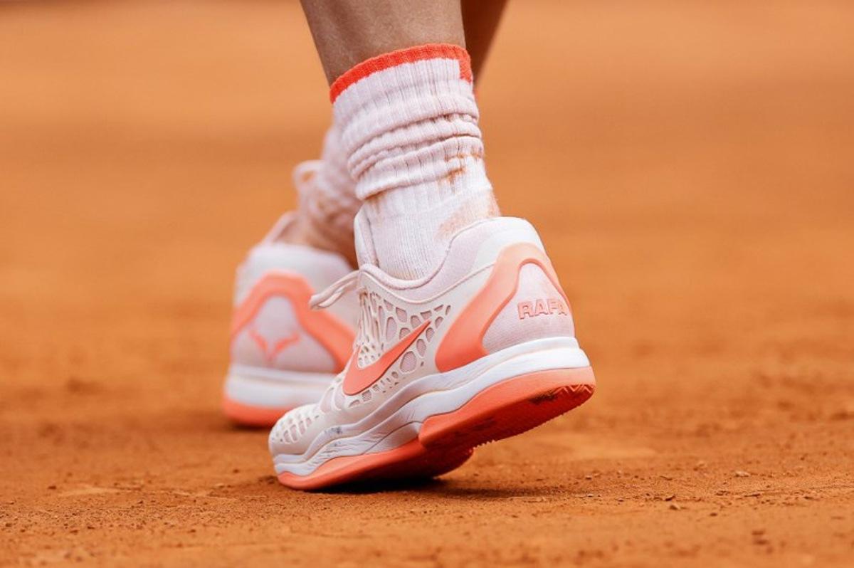 This photograph shows Spain's Rafael Nadal's shoes during the third round of the 2024 ATP Tour Madrid Open tournament tennis match at Caja Magica in Madrid on April 29, 2024. OSCAR DEL POZO / AFP