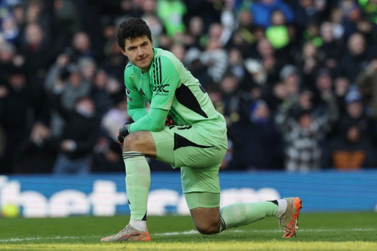 Manchester United's Belgian goalkeeper #31 Senne Lammens reacts after Leeds scored the opening goal during the English Premier League football match between Leeds United and Manchester United at Elland Road in Leeds, northern England on January 4, 2026. Darren Staples / AFP
