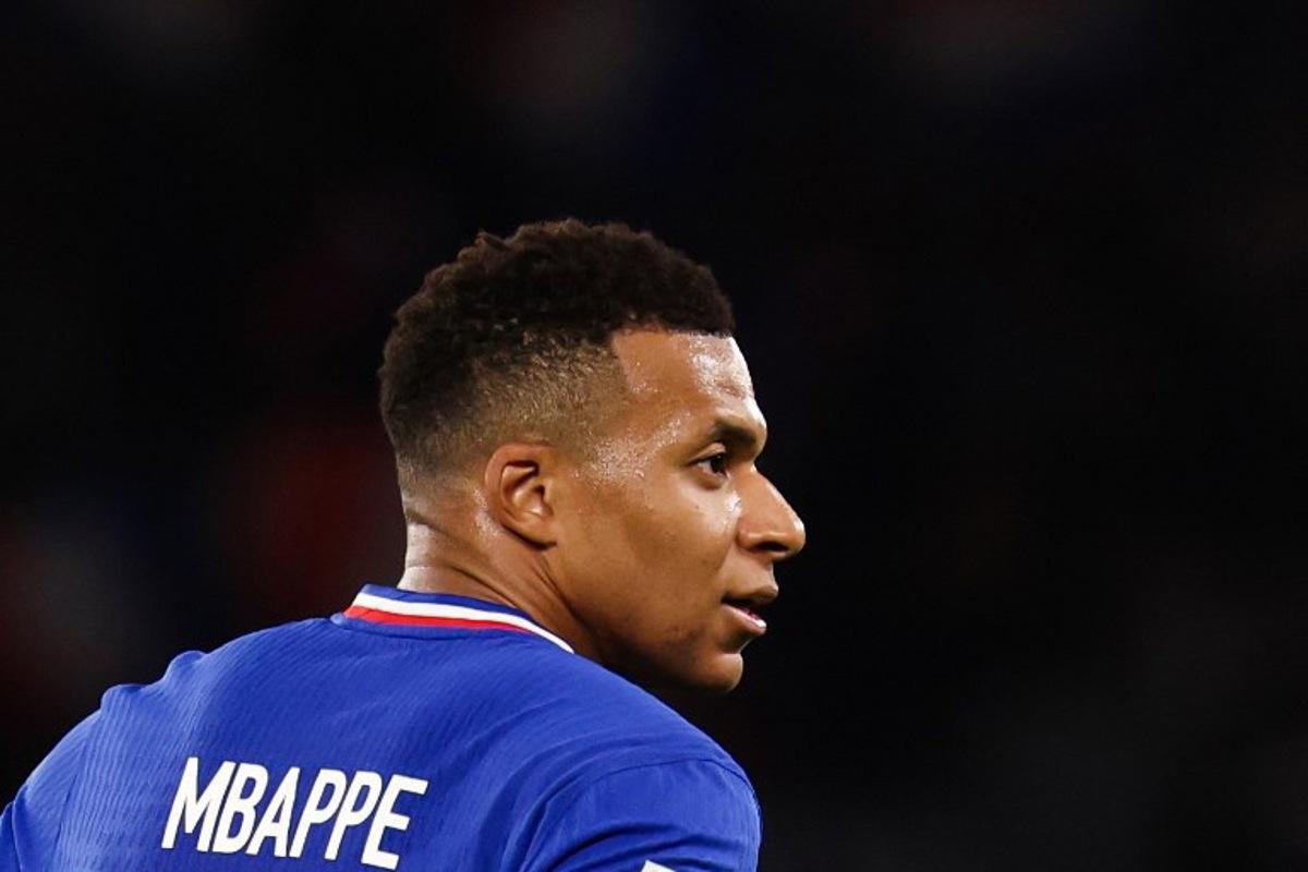 France's forward #10 Kylian Mbappe reacts during the 2026 World Cup qualifiers Europe zone group D football match between France and Ukraine at the Parc des Princes stadium in Paris, on November 13, 2025. FRANCK FIFE / AFP