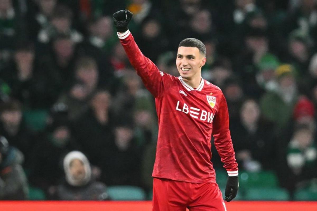 Stuttgart's Moroccan midfielder #11 Bilal El Khannouss celebrates after scoring the opening goal of the UEFA Europa League knockout round playoff, 1st leg football match between Celtic and Stuttgart at Celtic Park in Glasgow on February 19, 2026. ANDY BUCHANAN / AFP