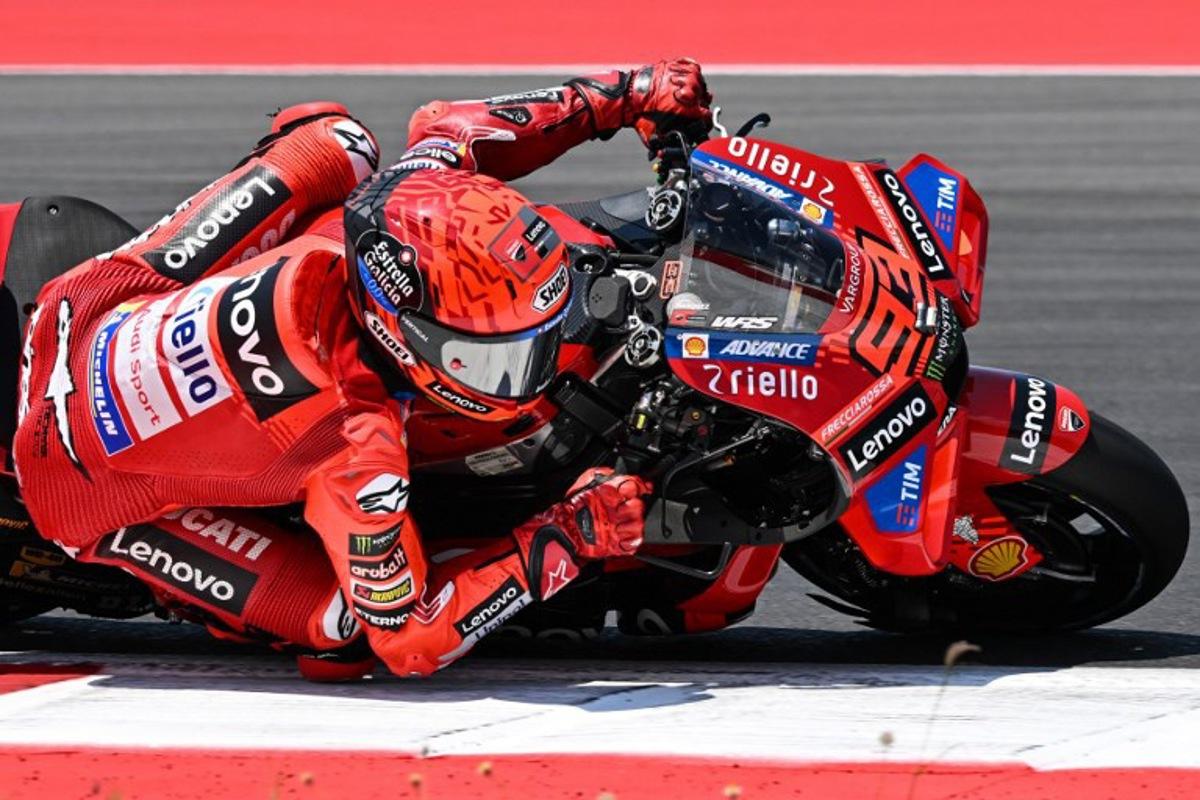 Ducati Lenovo Team's Spanish MotoGP rider Marc Marquez rides during the warm-up ahead of the MotoGP Indonesian Grand Prix at the Mandalika International Circuit in Mandalika, West Nusa Tenggara on October 5, 2025. SONNY TUMBELAKA / AFP