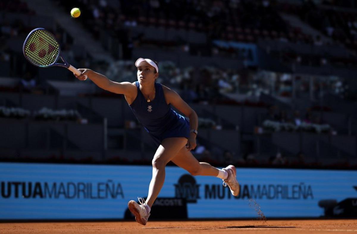 Belgium's Elise Mertens returns the ball to Belarus' Aryna Sabalenka during their 2025 WTA Tour Madrid Open tennis tournament third round singles match at the Caja Magica in Madrid, on April 27, 2025. Thomas COEX / AFP