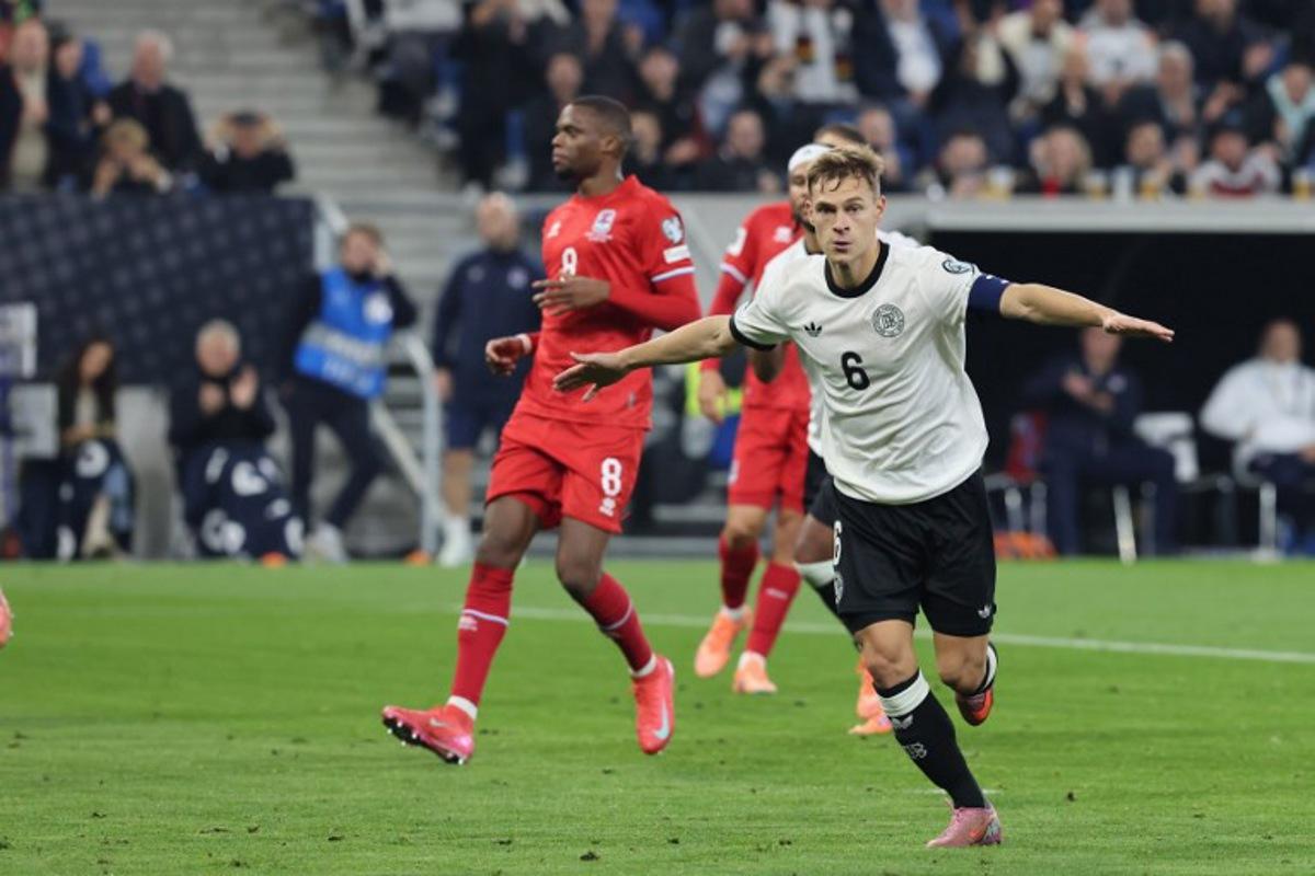 Germany's midfielder #06 Joshua Kimmich celebrates after shooting from the penalty spot to score his team's second goal during the 2026 World Cup qualifiers Europe zone group A football match between Germany and Luxembourg on October 10, 2025 in Sinsheim, western Germany Daniel ROLAND / AFP