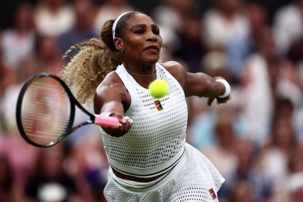 US player Serena Williams returns the ball to Australia's Maya Joint during their women's singles first round tennis match on the second day of the 2026 Wimbledon Championships at The All England Lawn Tennis and Croquet Club in Wimbledon, southwest London, on June 30, 2026. HENRY NICHOLLS / AFP