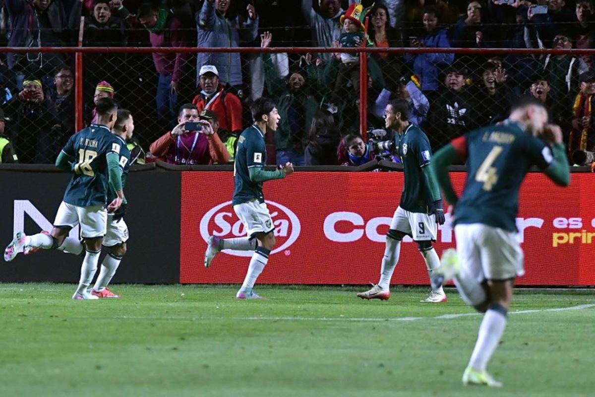 Bolivia's forward #07 Miguel Terceros (C) celebrates with his teammates after scoring his team's first goal during the 2026 FIFA World Cup South American qualifiers football match between Bolivia and Brazil, at the Municipal de El Alto stadium, in El Alto, La Paz department, Bolivia on September 9, 2025. Daniel MIRANDA / AFP