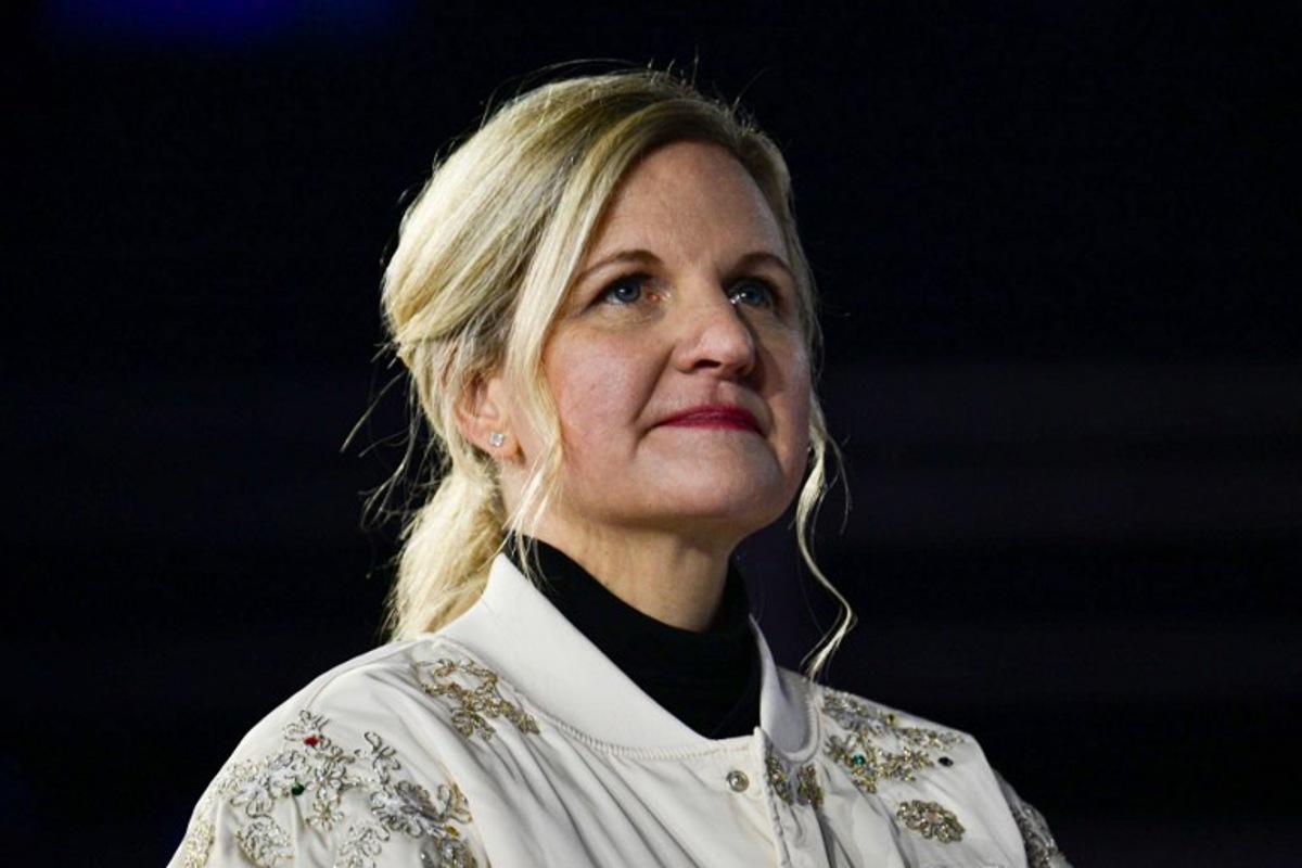 President of the International Olympic Committee (IOC) Kirsty Coventry attends the podium cveremony for the men's cross country 50km mass start final event of the Milano Cortina 2026 Winter Olympic Games, within the games' closing ceremony at the Verona Arena in Verona on February 22, 2026. Stefano RELLANDINI / AFP