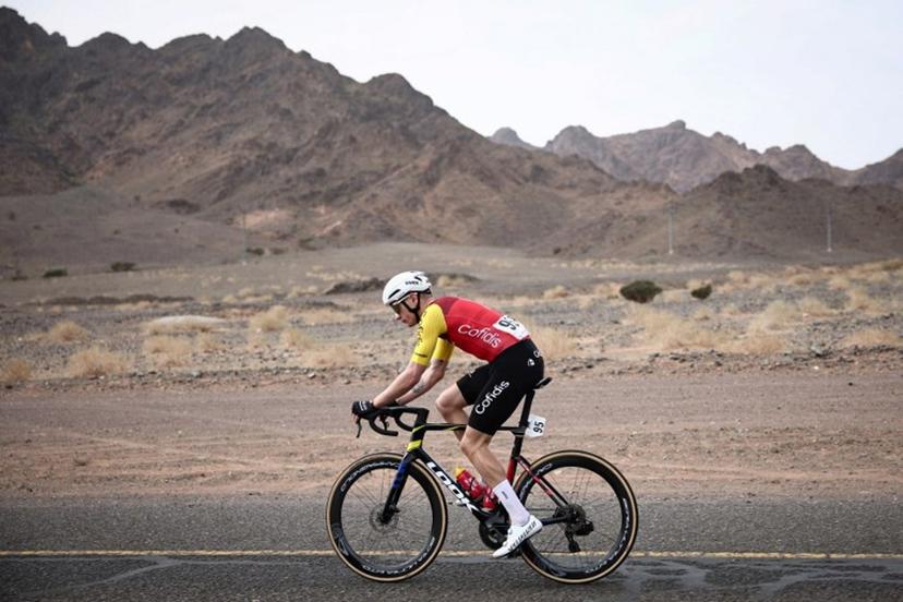 Cofidis cycling team's French Hugo Page rides during the first stage of the AlUla Tour cycling race, a 158 km race started and finished in the Saudi desert city of AlUla, on January 27, 2026. Anne-Christine POUJOULAT / AFP