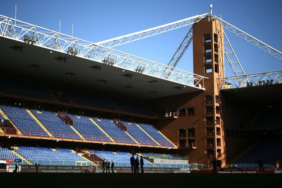 A general view shows empty stands at the Luigi-Ferraris Stadium before the Italian Serie A football match between Genoa and Juventus in Genoa, on September 28, 2024. The match will be played behind closed doors due to clashes that occured between Genoa and Sampdoria supporters in a past Italian Cup match. MARCO BERTORELLO / AFP