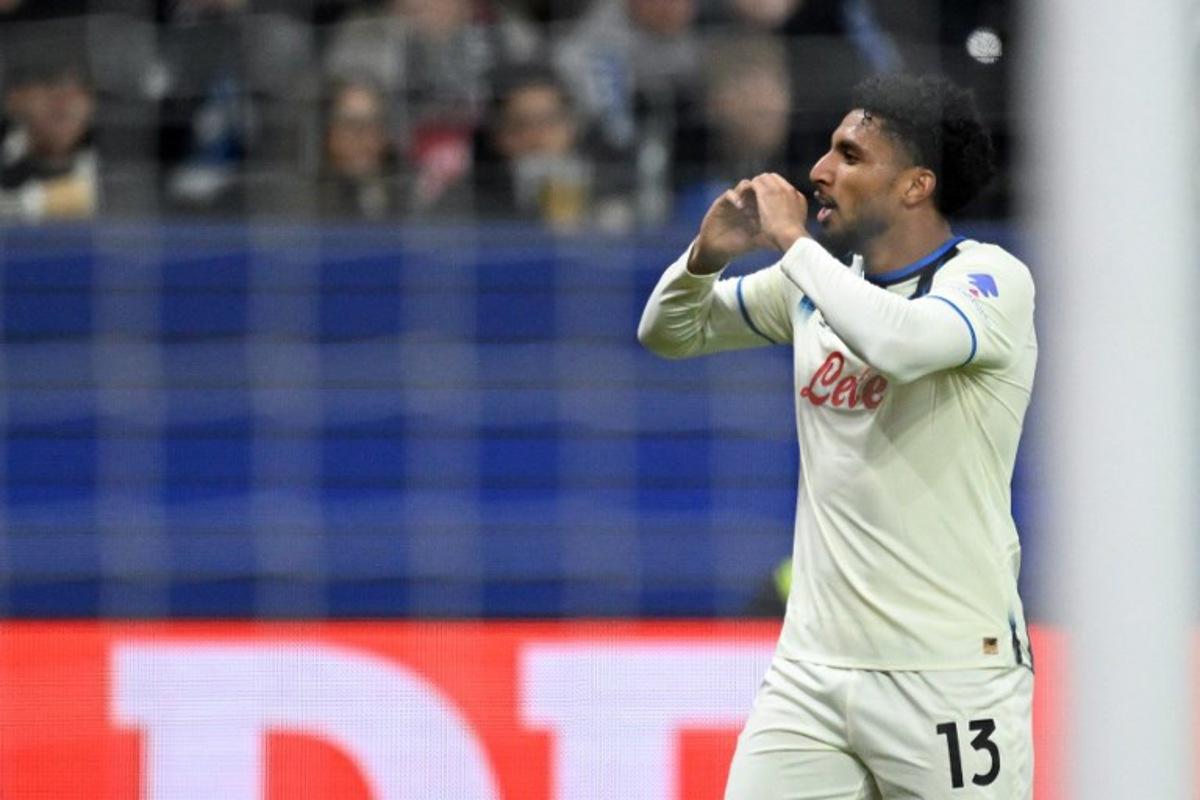 Atalanta's Brazilian midfielder #13 Ederson celebrates scoring his team's second goal during the UEFA Champions League league phase day 5 football match between Eintracht Frankfurt and Atalanta Bergamo in Frankfurt, Germany, on November 26, 2025. Kirill KUDRYAVTSEV / AFP