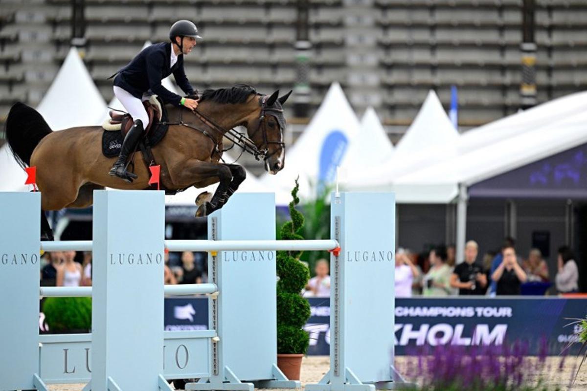Belgium's Pieter Devos on the horse Nascar van 't Siamshof competes during the Global Champions League 1.55m Round 1 Team Competition of the Longines Global Champions Tour at Stockholm's historic Olympic Stadium, Sweden, on June 29, 2024. Magnus LEJHALL / TT News Agency / AFP