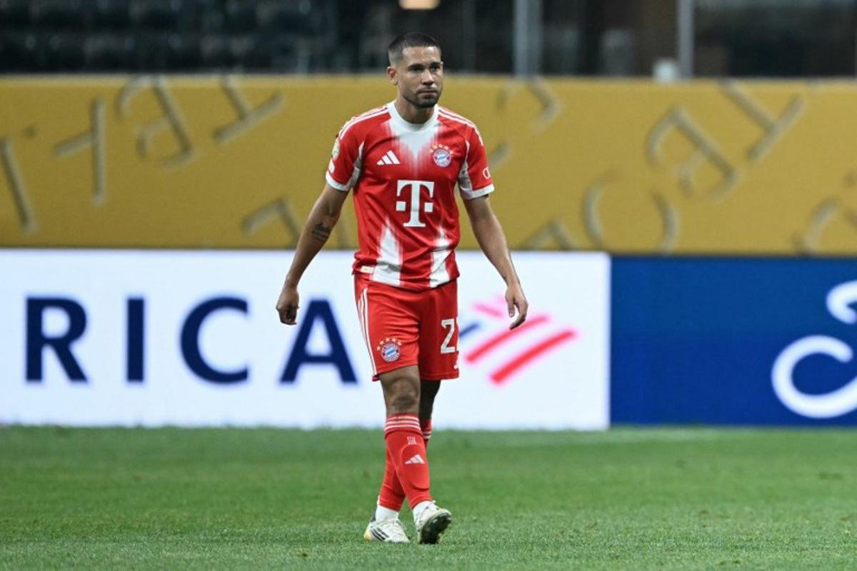 Bayern Munich's Portuguese defender #22 Raphael Guerreiro reacts after losing the FIFA Club World Cup 2025 quarterfinal football match between France's Paris Saint-Germain and Germany's Bayern Munich at the Mercedes-Benz Stadium in Atlanta on July 5, 2025. PATRICIA DE MELO MOREIRA / AFP