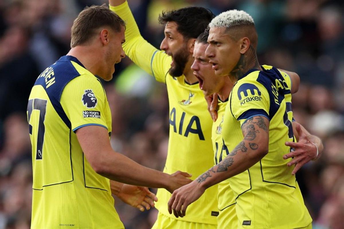 Tottenham Hotspur's English midfielder #22 Conor Gallagher (2R) celebrates scoring the team's first goal with teammates during the English Premier League football match between Aston Villa and Tottenham Hotspur at Villa Park in Birmingham, central England on May 3, 2026. Adrian Dennis / AFP