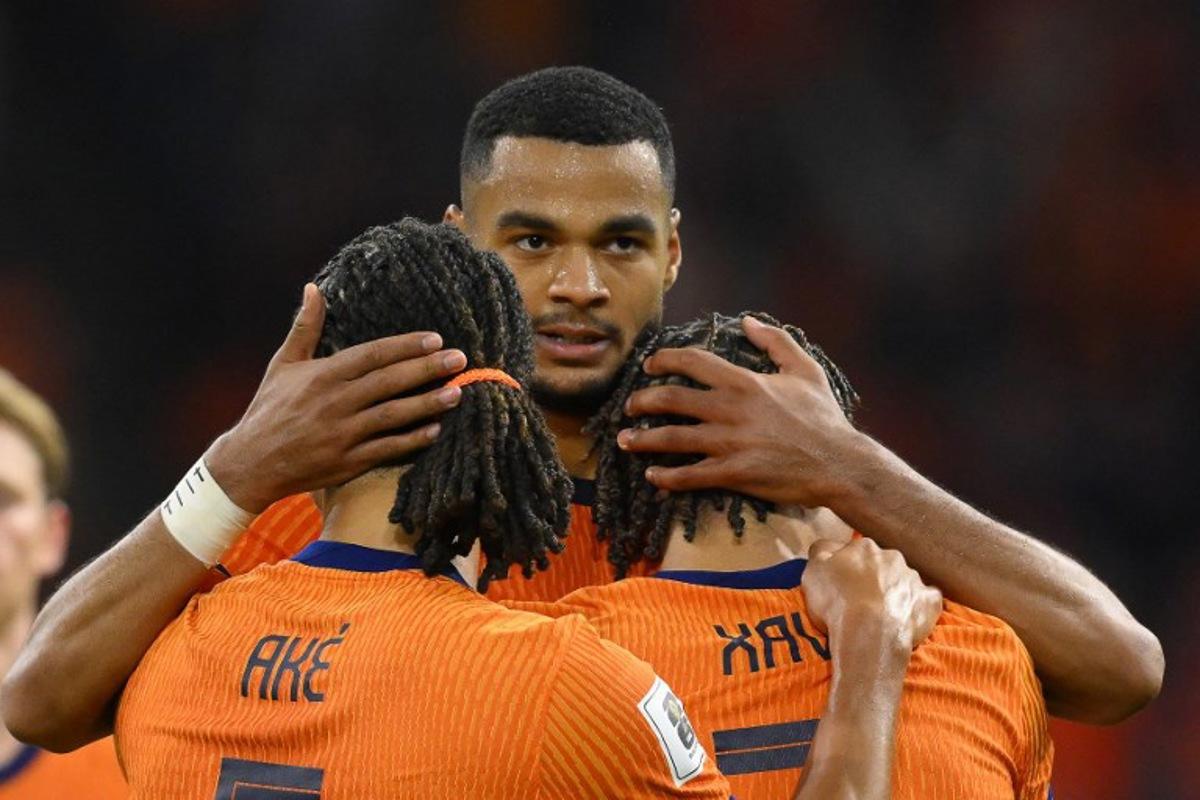 Netherlands' forward #11 Cody Gakpo (C) celebrates with teammates after scoring his team's fourth goalduring the FIFA World Cup 2026 Group G qualification football match between Netherlands and Finland, at the Johan Cruyff Arena in Amsterdam, on October 12, 2025. JOHN THYS / AFP